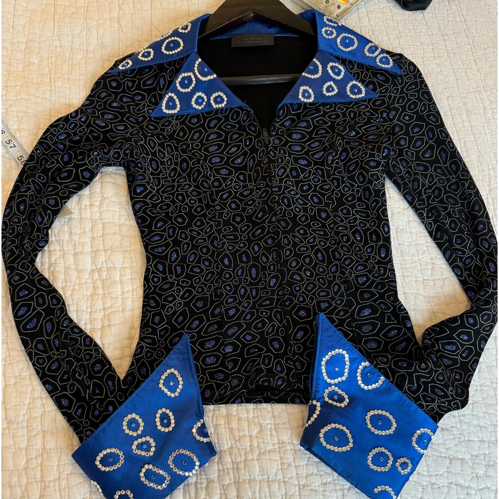 Top black and blue and stones